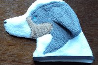 Soft, microfiber terry cloth towels made in the shape of an Australian Shepherd