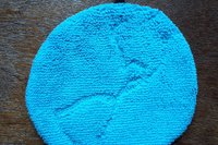 This is a view of the back side of Clean Earth. The back side is a solid blue