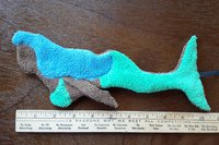 Brown mermaid with blue hair