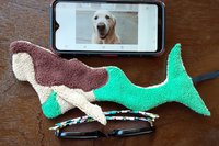 Mermaid with phone and glasses two of the items it can clean