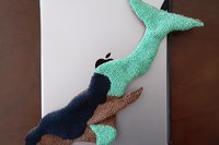 Mermaid attached to popular tablet.