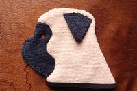 Soft, microfiber terry cloth towels cut, sewn, and made in the shape of a dog