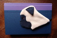 Smudge Dogs being used as a bookmark