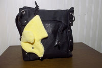 Smudge dog attached to handbag always within reach.