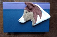 Smudge Dog used as bookmark.