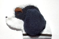 Soft, microfiber terry cloth towels cut, sewn, and made in the shape of a dog