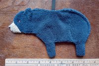 Smudge Bear shown with elastic loop with ruler in photo.