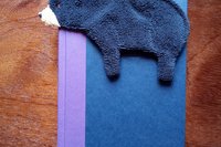 Smudge Bear used as a bookmark.