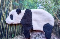 Soft, microfiber terry cloth towels  made in the shape of a Panda.