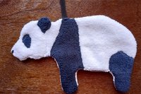 Smudge Bear on wood background