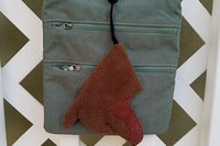 Smudge dog attached to a handbag always within reach.