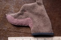 Smudge Dog with ruler to show size.
