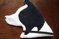 Soft, microfiber terry cloth towels cut, sewn, and made in the shape of a dog