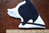 Smudge Dog shown with ruler to show size.