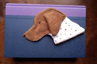 Smudge Dog being used as a bookmark