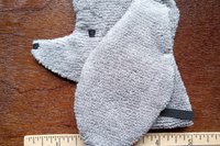Smudge Dog with ruler to show size.