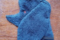 Soft, microfiber terry cloth towels cut, sewn, and made in the shape of a dog