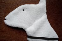 Soft, microfiber terry cloth towels cut, sewn, and made in the shape of a dog