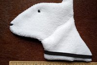 Smudge Dog with ruler to show size.