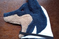 Soft, microfiber terry cloth towels cut, sewn, and made in the shape of a dog