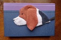 Smudge Dog used as bookmark.