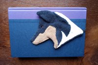 Smudge Dog used as bookmark.