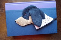 Smudge Dog used as bookmark.