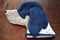 Soft, microfiber terry cloth towels cut, sewn, and made in the shape of a dog