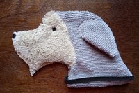 Soft, microfiber terry cloth towels cut, sewn, and made in the shape of a dog