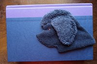 Smudge Dog used as bookmark.