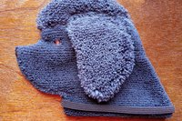 Soft, microfiber terry cloth towels cut, sewn, and made in the shape of a dog