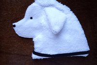 Soft, microfiber terry cloth towels cut, sewn, and made in the shape of a dog