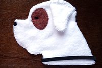 Soft, microfiber terry cloth towels cut, sewn, and made in the shape of a dog