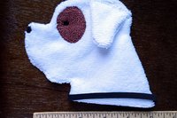 Portie shown with a ruler to demonstrate size.