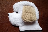 Soft, microfiber terry cloth towels cut, sewn, and made in the shape of a dog