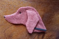 Soft, microfiber terry cloth towels cut, sewn, and made in the shape of a dog