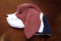 Soft, microfiber terry cloth towels cut, sewn, and made in the shape of a dog