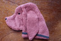 Soft, microfiber terry cloth towels cut, sewn, and made in the shape of a dog