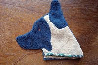 Soft, microfiber terry cloth towels cut, sewn, and made in the shape of a dog