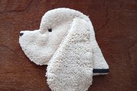 Soft, microfiber terry cloth towels cut, sewn, and made in the shape of a dog