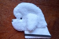 Soft, microfiber terry cloth towels cut, sewn, and made in the shape of a dog