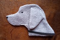 Soft, microfiber terry cloth towels cut, sewn, and made in the shape of a dog