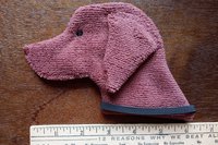 Smudge Dog with ruler to show size.