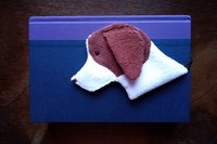 Smudge Dog used as a bookmark.