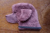 Soft, microfiber terry cloth towels cut, sewn, and made in the shape of a dog