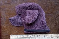 Smudge Dog shown with ruler to show size.