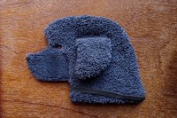 Soft, microfiber terry cloth towels cut, sewn, and made in the shape of a dog
