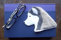 Smudge Dog used as a bookmark.