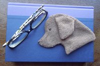 Smudge Dog used as a bookmark.