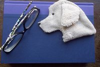 Smudge Dog used as a bookmark.
